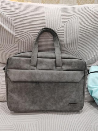 15寸电脑包尺寸长宽高是多少，15寸电脑包比14寸大多少