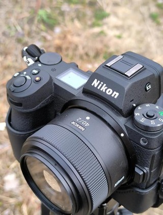 佳能尼康镜头能通用吗，尼康机身用佳能镜头