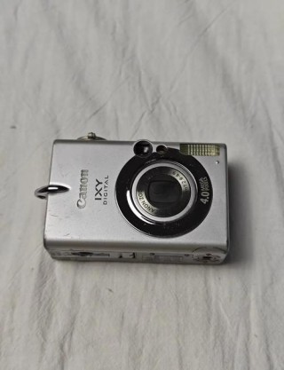 佳能ixus70电池，佳能IXUS70电池仓里面