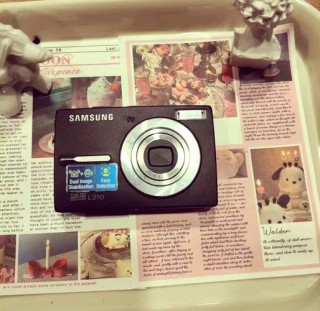 三星蓝调l201相机怎么充电，三星蓝调l100相机充电橘色灯闪烁