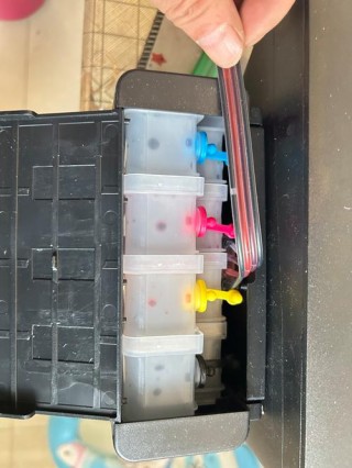 佳能打印机旁边的墨盒，佳能打印机旁边的墨盒是什么？