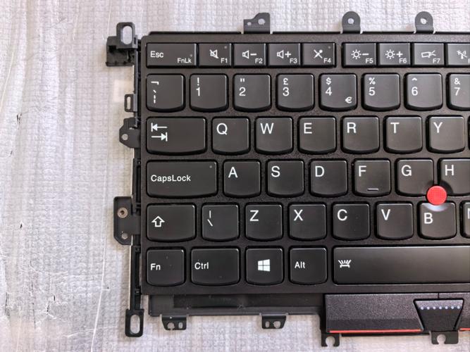 联想thinkpad触摸板中间的那个按键有什么用?