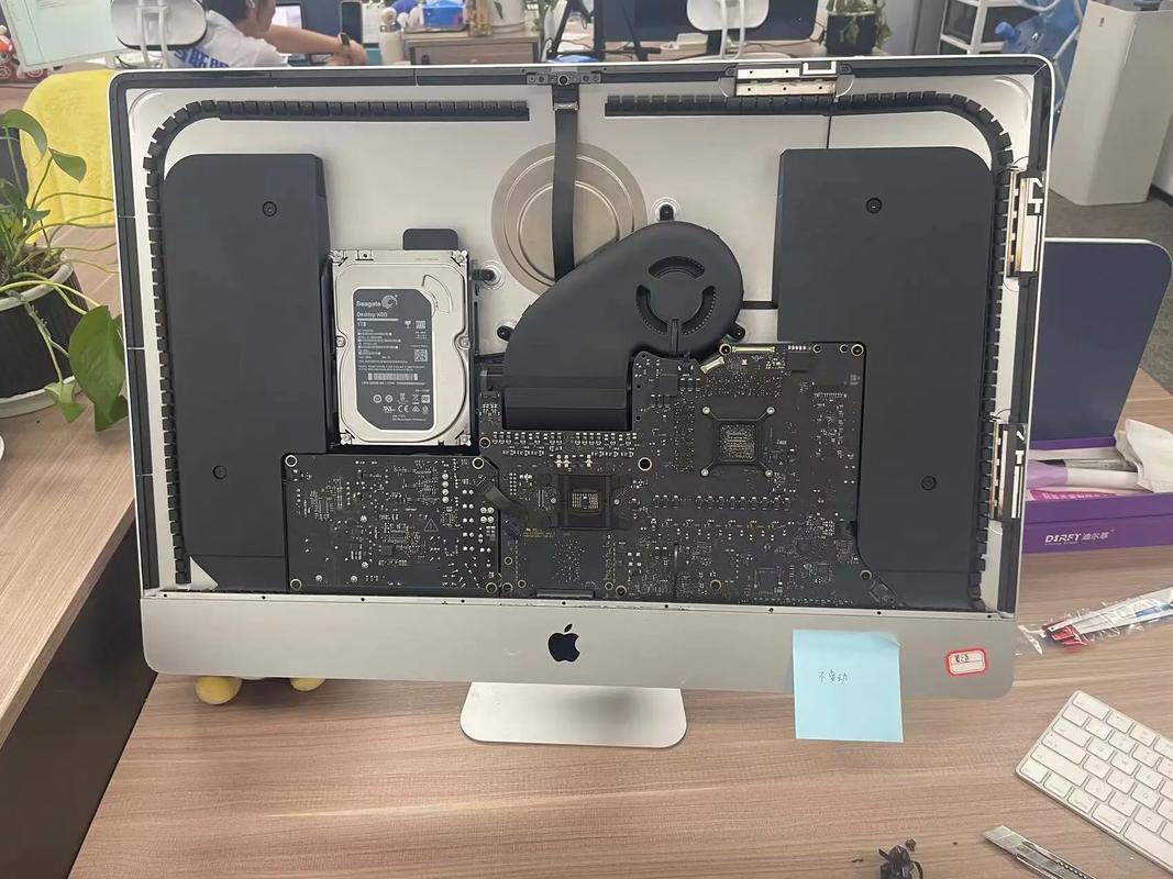 苹果一体机拆机方法(升级内存及固态硬盘)