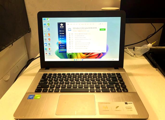 华硕笔记本X541Nwin10改win7主板里面怎么改