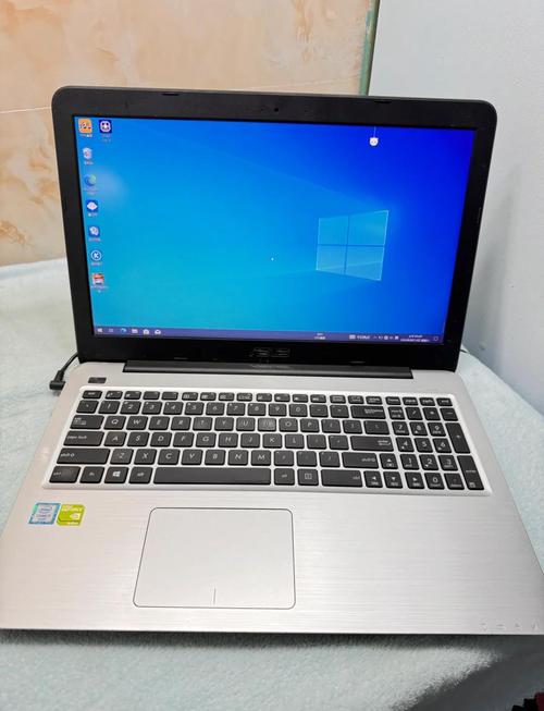 华硕笔记本电脑x555ld后盖一体的,怎么打开