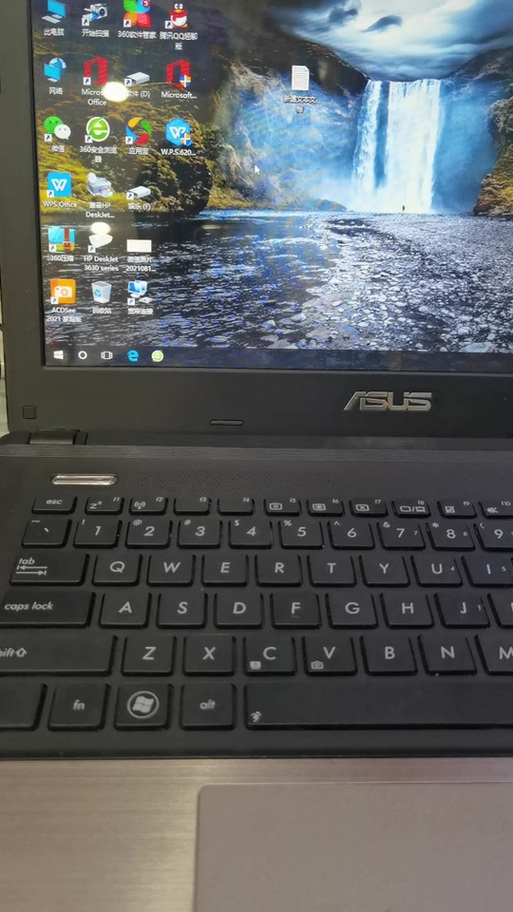 华硕笔记本怎么把后盖打开啊,