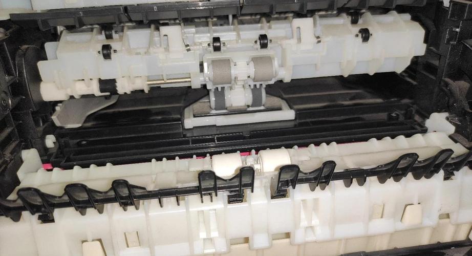 佳能e568卡纸了怎么办