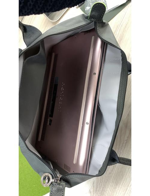 我的笔记本电脑是14寸的(长34cm,宽24cm)准备在网上买一个包,不知道是...