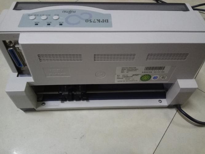 富士通dpk810打印机为什么巳换色带还是不显字怎样修?