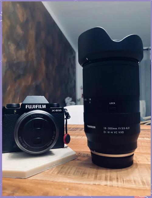 腾龙的18『2』00镜头怎么样,我的机器是尼康的D90和D3000