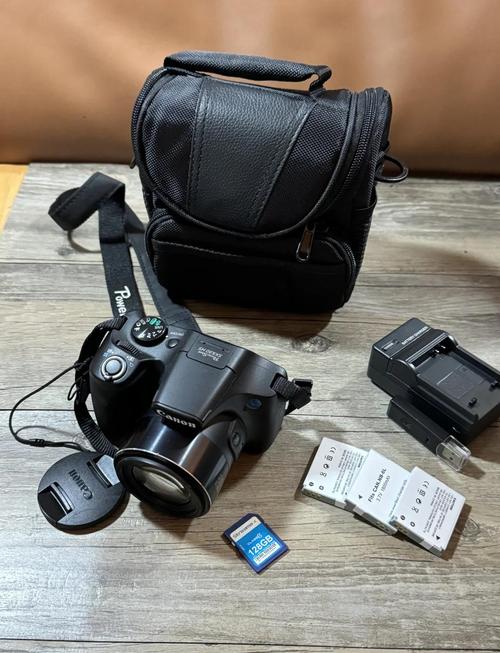 最近打算买个数码相机,平时旅游和生活拍照,单反好还是卡片的好?推荐...