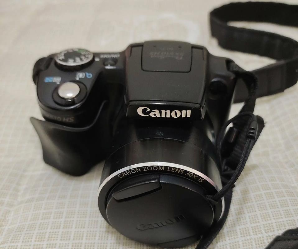 佳能sx50hs和sx720hs哪个好