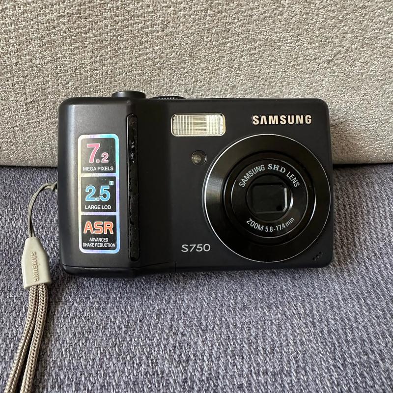 三星s750相机怎么开机