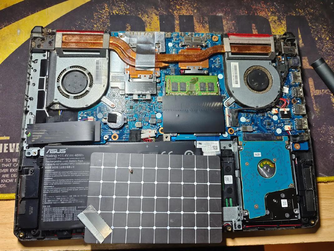 手提修电脑换主板多少钱?