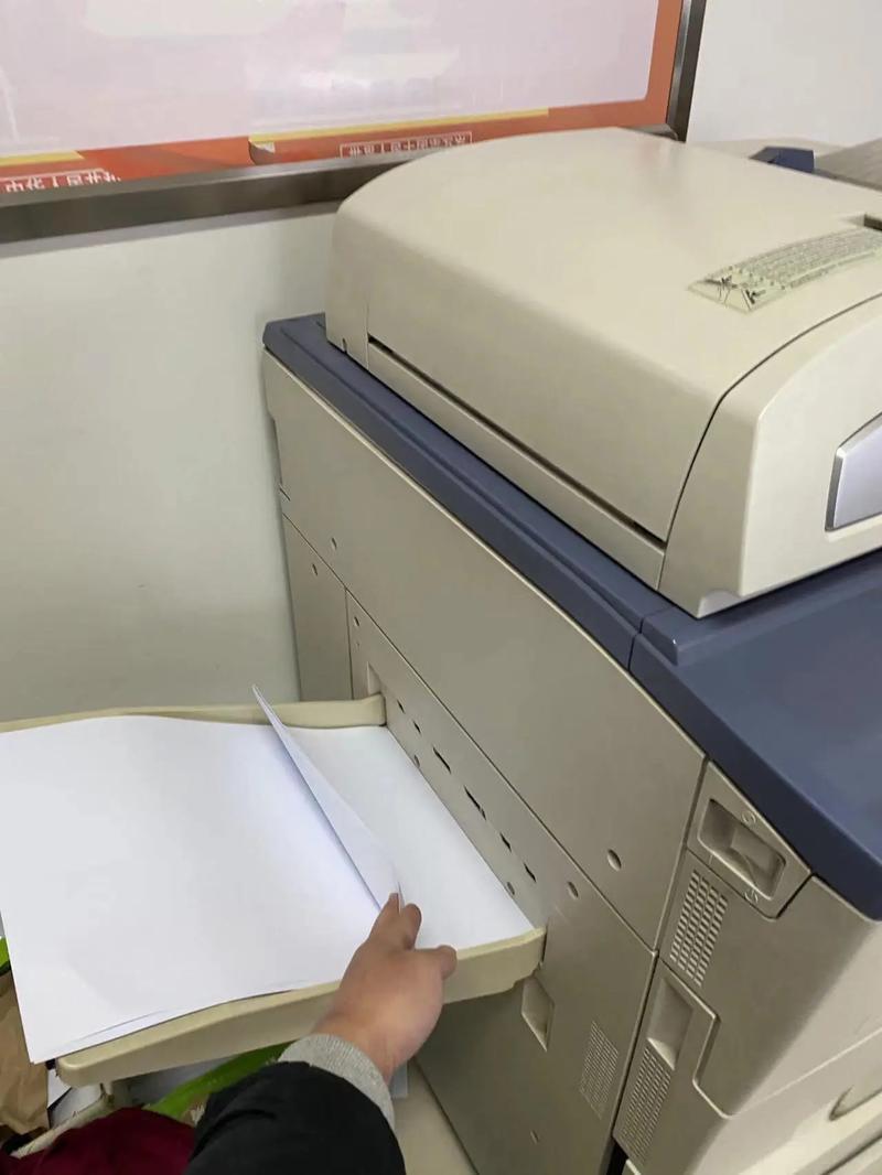 东芝180s打印机为什么从后面出纸了