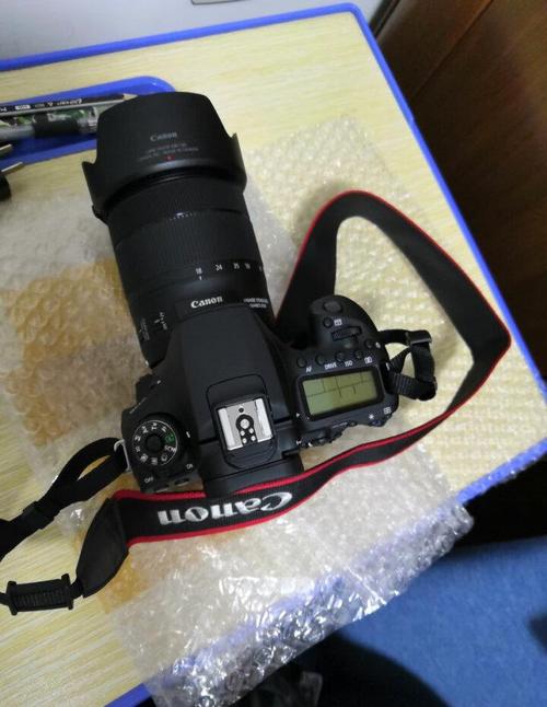 买单反相机D90和60D哪个好,性价比高.我有时要拍一些风景,要放大到几米...