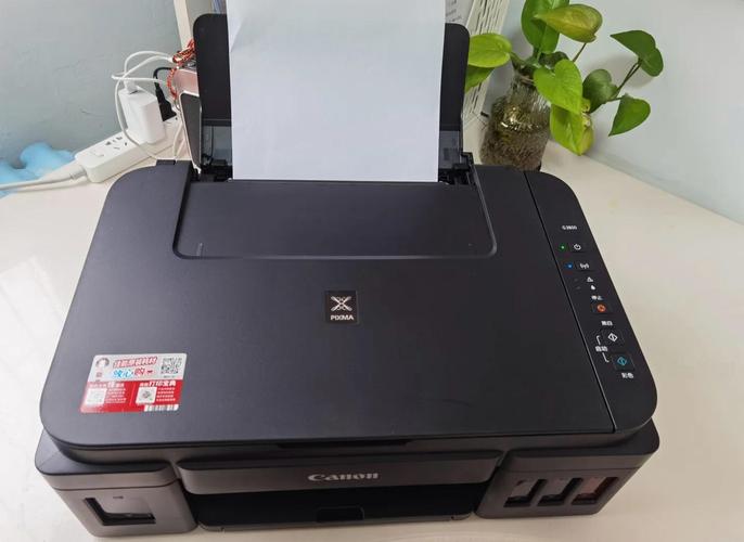 佳能4色打印机彩色打印出来有一条条横是咋回事啊