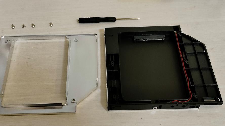 戴尔N4110在光驱位装原机械硬盘,光驱位硬盘托架应该需要多大的?7mm?9....