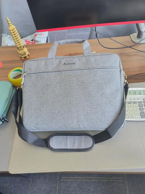 我的笔记本电脑是14寸的(长34cm,宽24cm)准备在网上买一个包,不知道是...