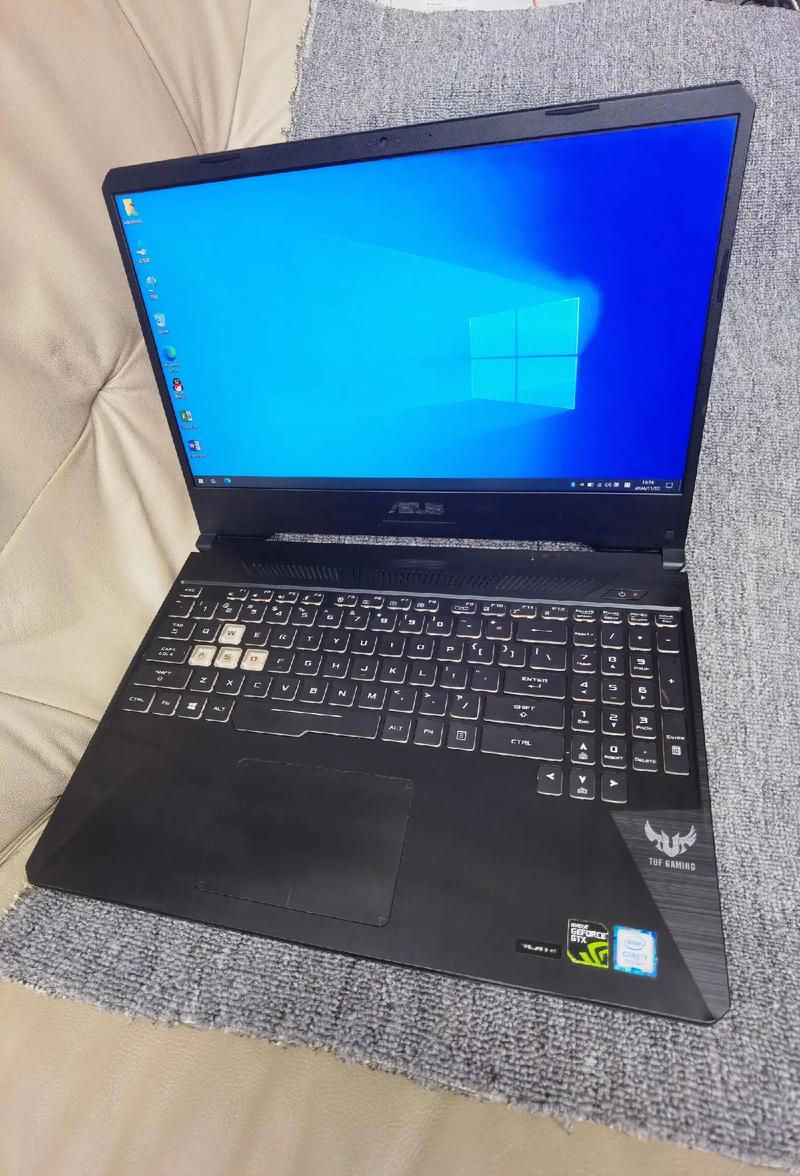 华硕天使之翼笔记本触摸板下五个指示灯分别代表什么意思?